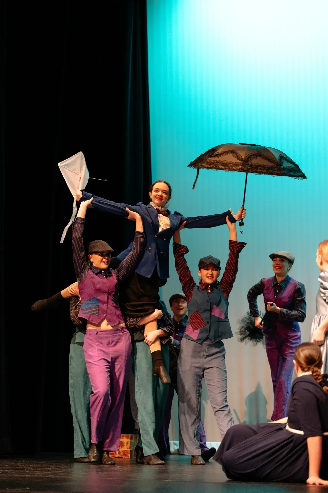VPS Academy students performing on stage in a musical theatre production
