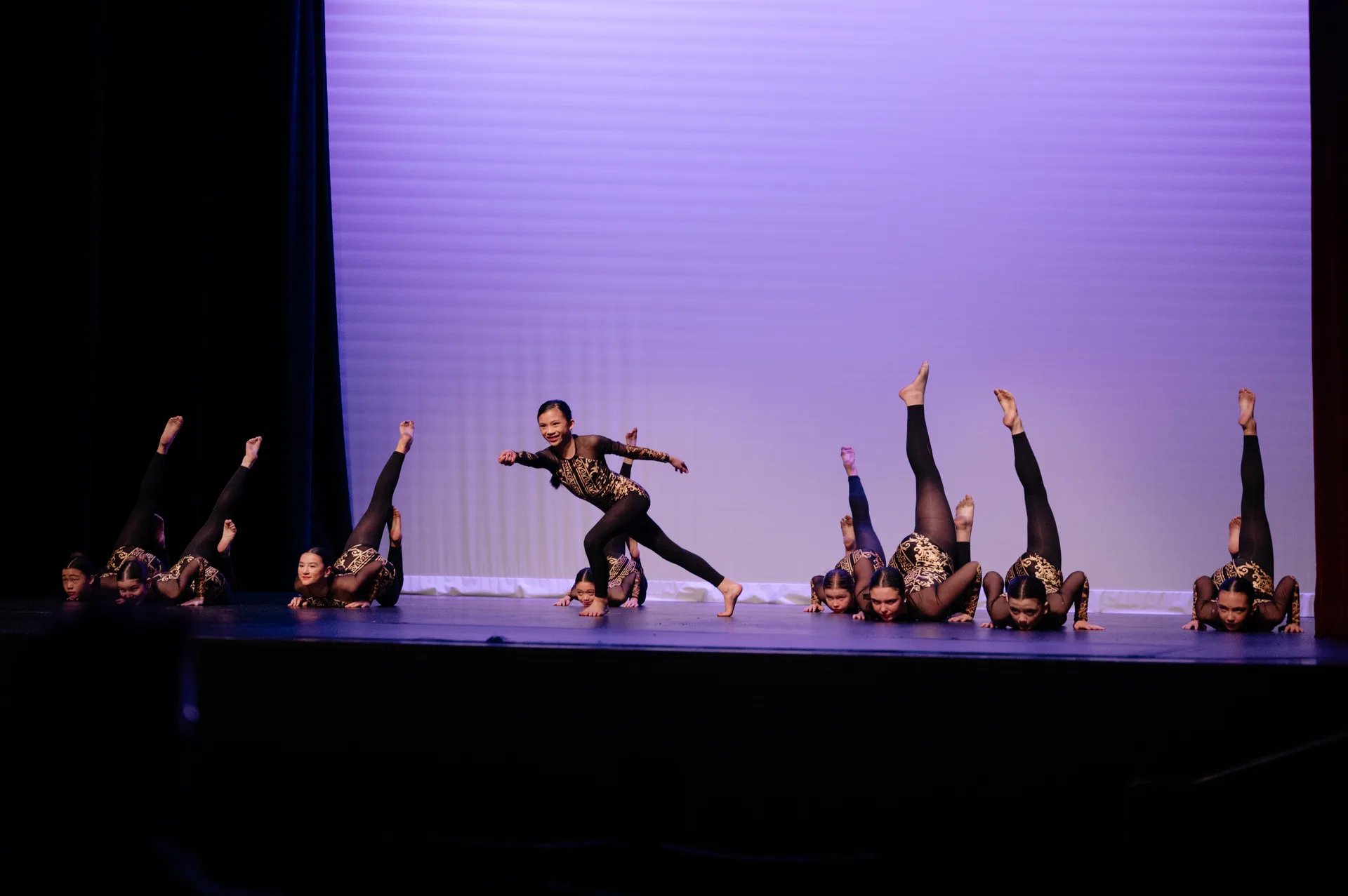 Acro dancer mid-move