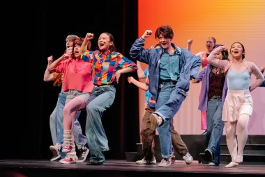 VPS Musical Company students performing on stage