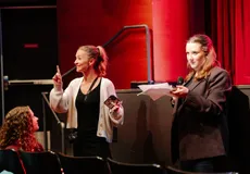 Katy Finlay directing students in the VPS theatre