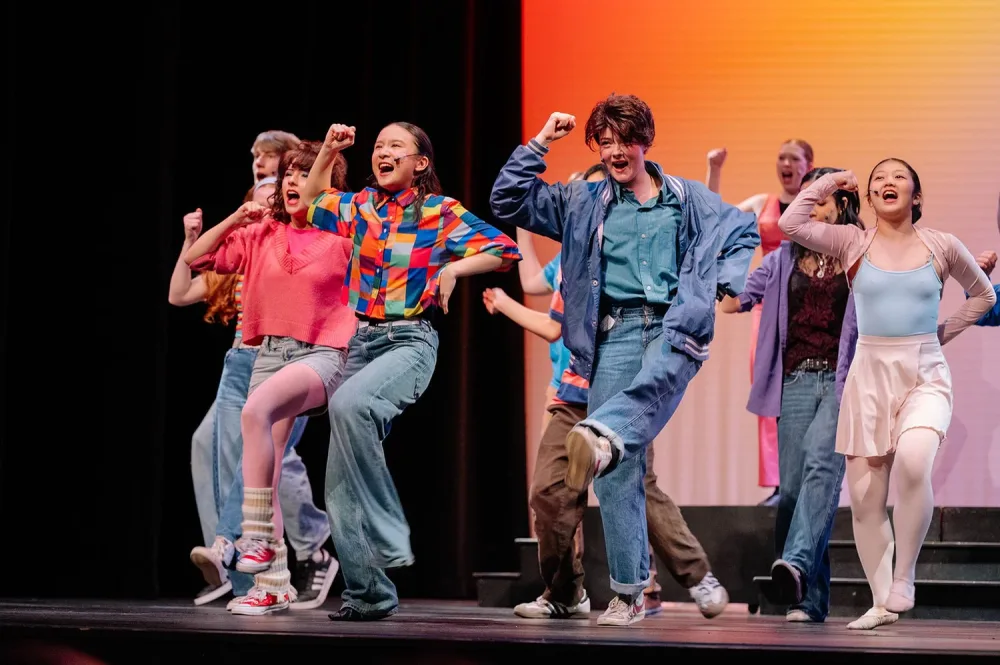 VPS Musical Theatre students performing on stage in a musical production