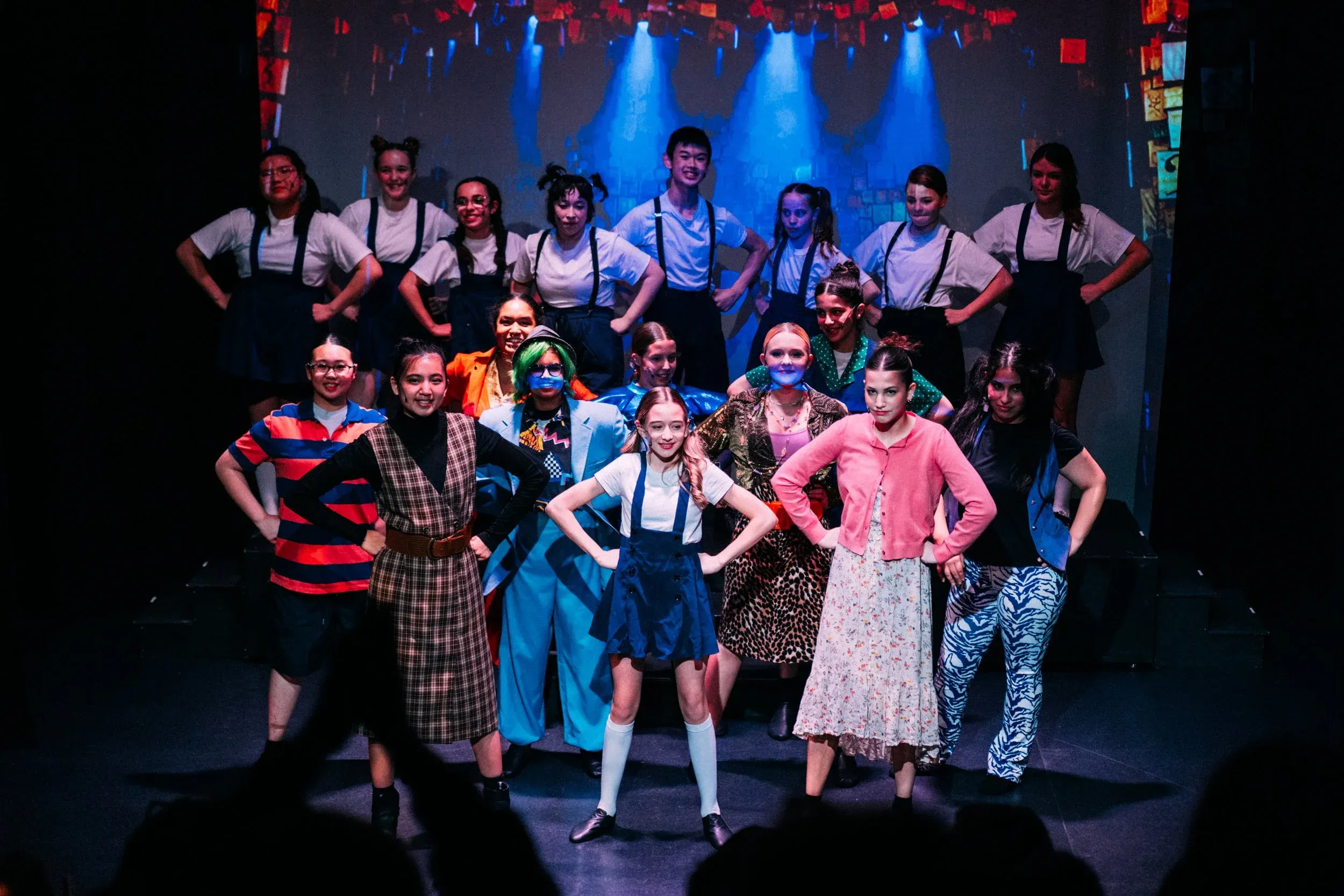 VPS Musical Company ensemble cast on stage in costume during a full production